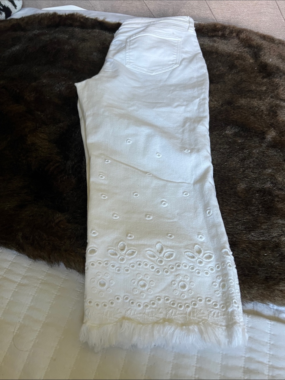 Chico's White Eyelet Fringe slim leg crop pant.